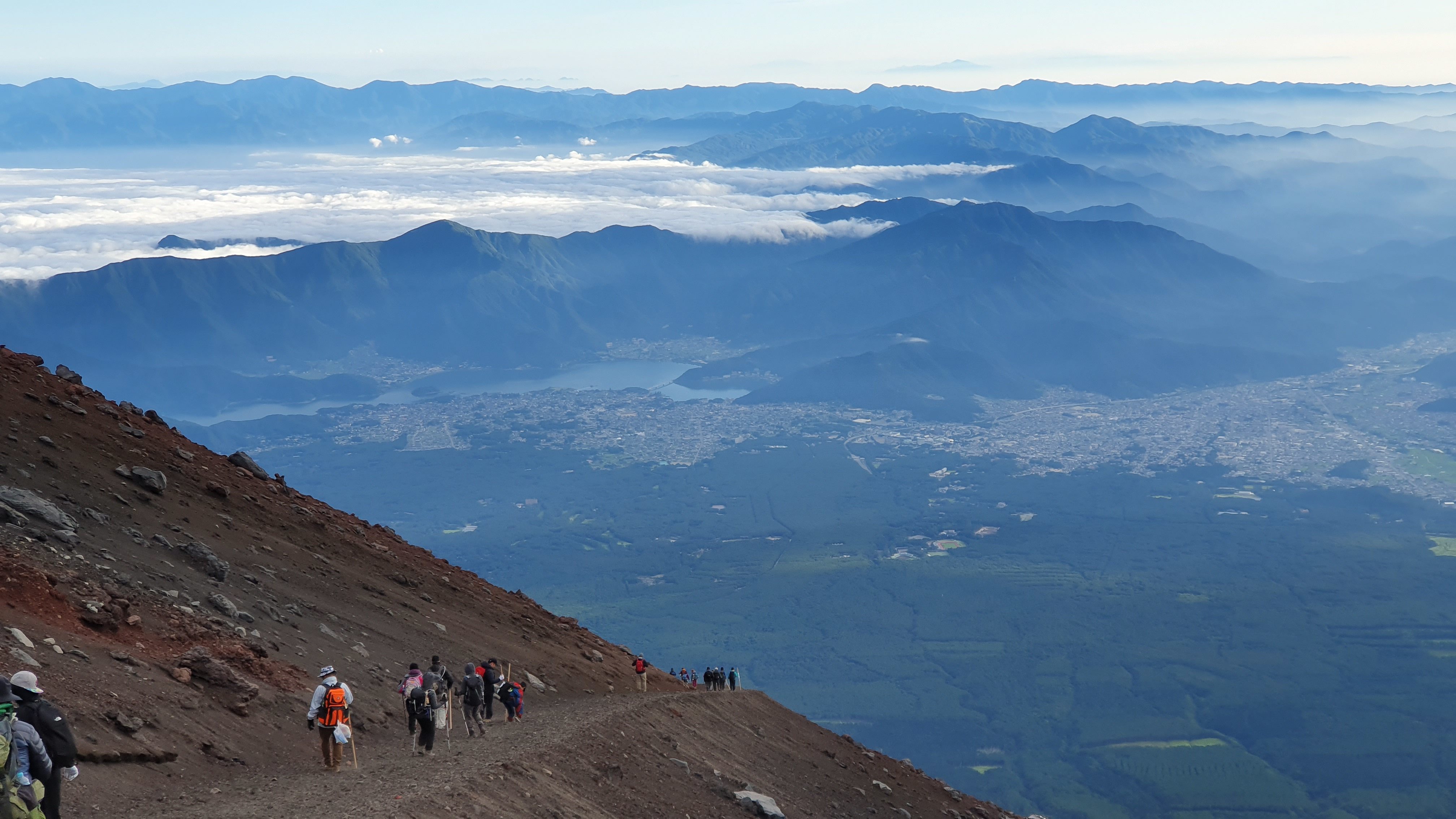 Hikers climbing down Mt Fuji